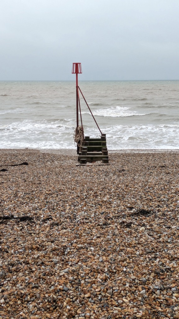 One of the groynes at Bognor Regis looking down towards the sea from the stony beach